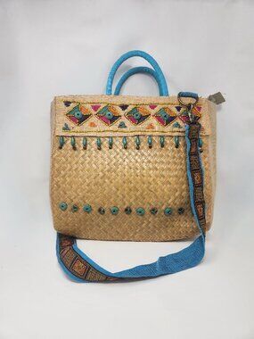New straw bag with turquoise handle